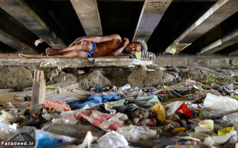 مرد بی‌خانمان در مانیل، فیلیپین